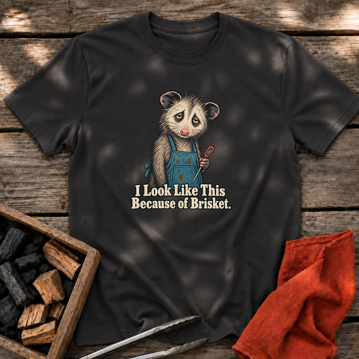 Black T-shirt with the design “I Look Like This Because of Brisket.” printed on the front.
