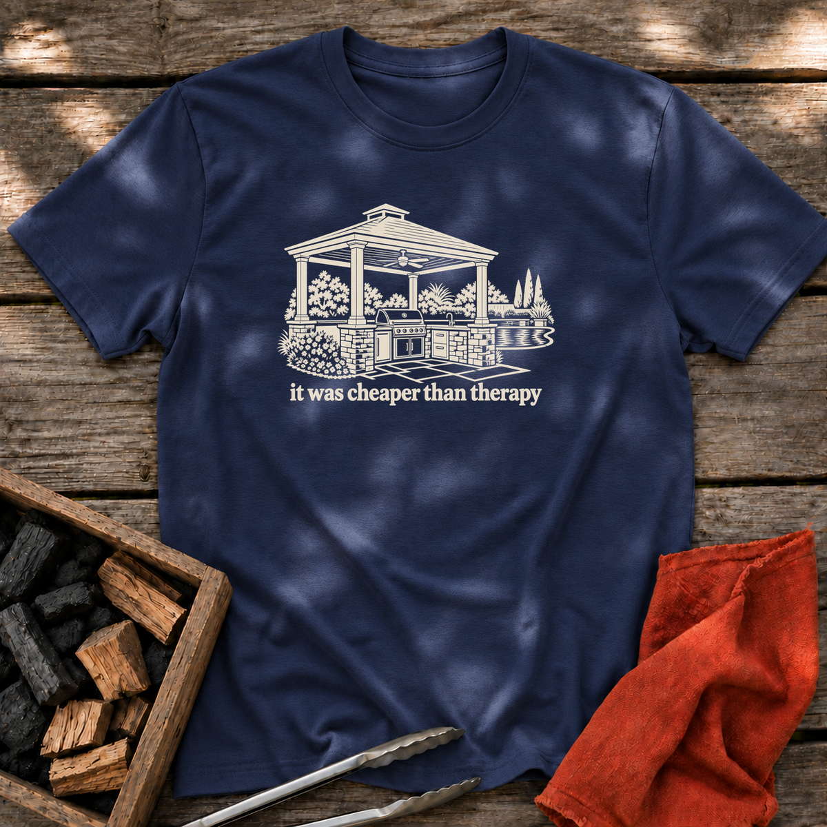 Navy T-shirt with the design “it was cheaper than therapy” printed on the front.