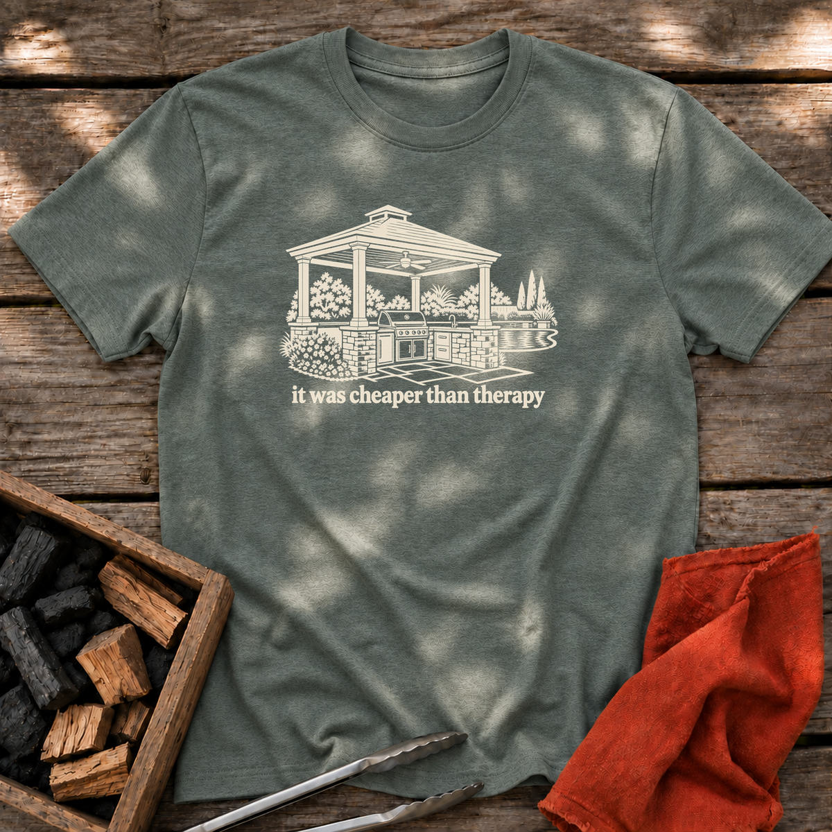 Heather Military Green T-shirt with the design “it was cheaper than therapy” printed on the front.