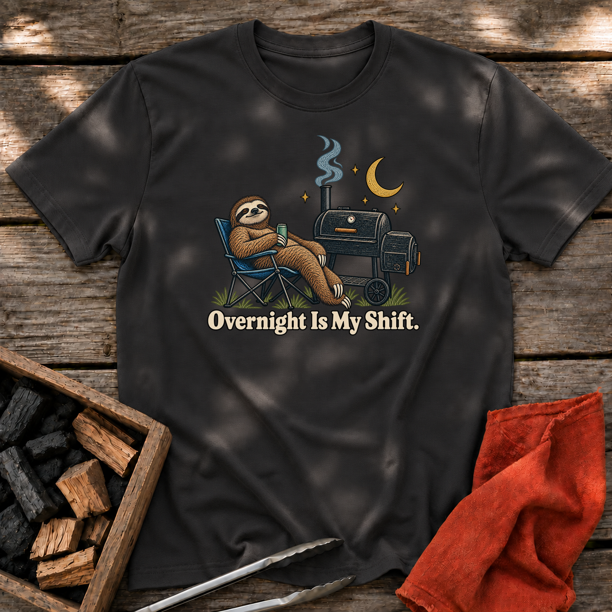 Black T-shirt with the design “Overnight Is My Shift.” printed on the front.