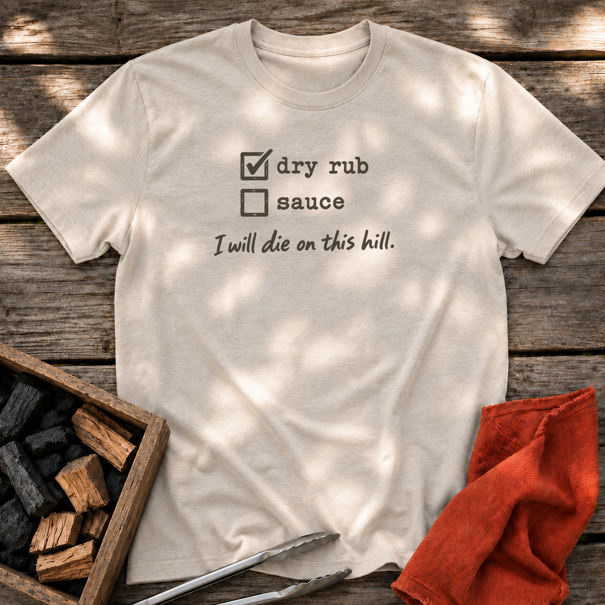 Natural T-shirt with the design “I will die on this hill.” printed on the front.