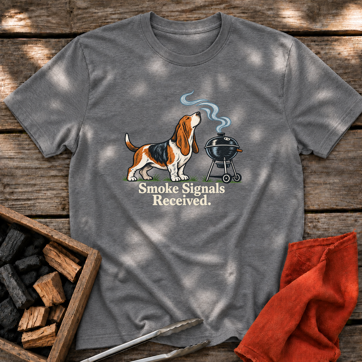 Graphite Heather T-shirt with the design “Smoke Signals Received.” printed on the front.