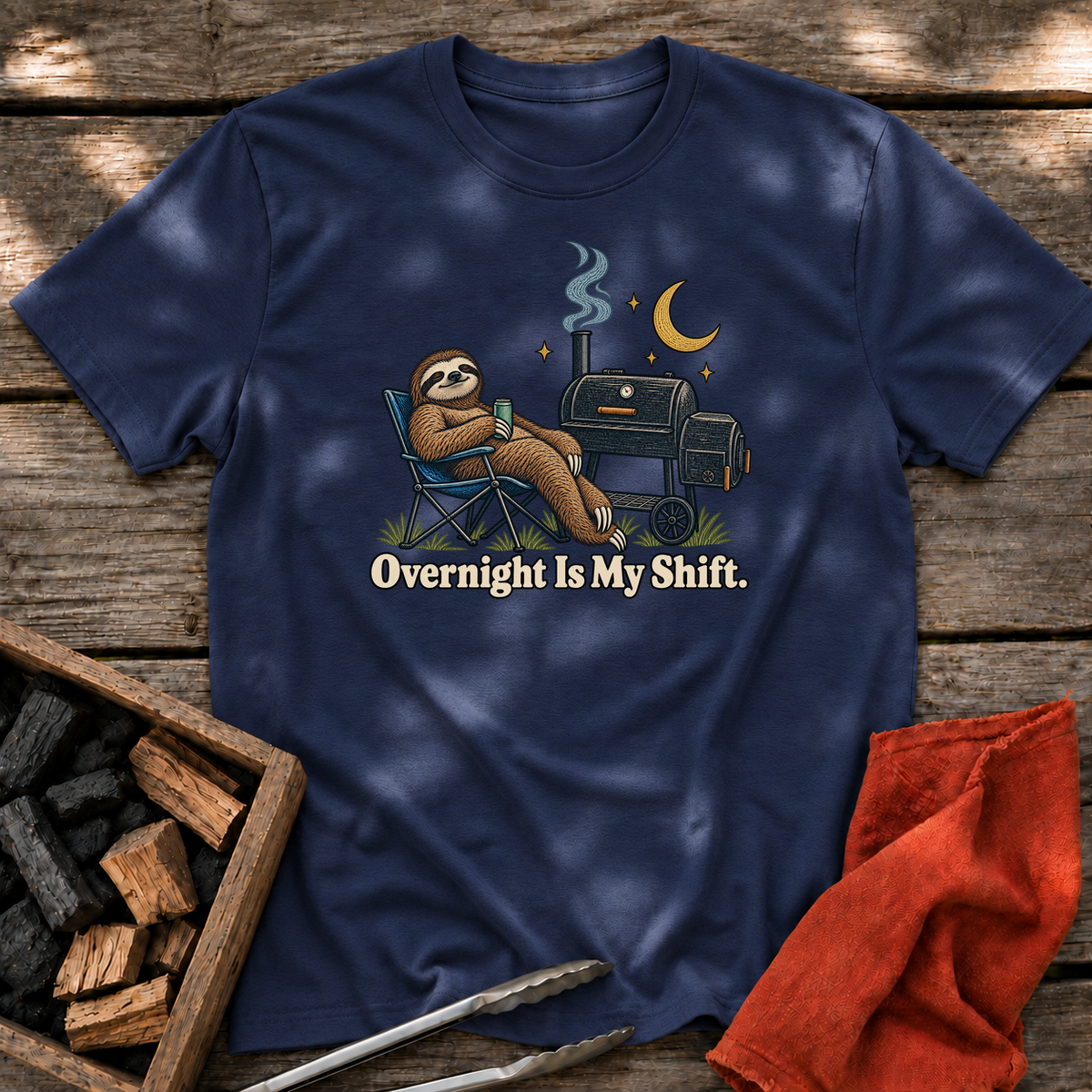 Navy T-shirt with the design “Overnight Is My Shift.” printed on the front.