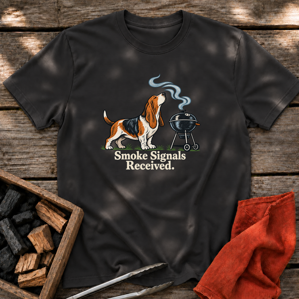 Black T-shirt with the design “Smoke Signals Received.” printed on the front.