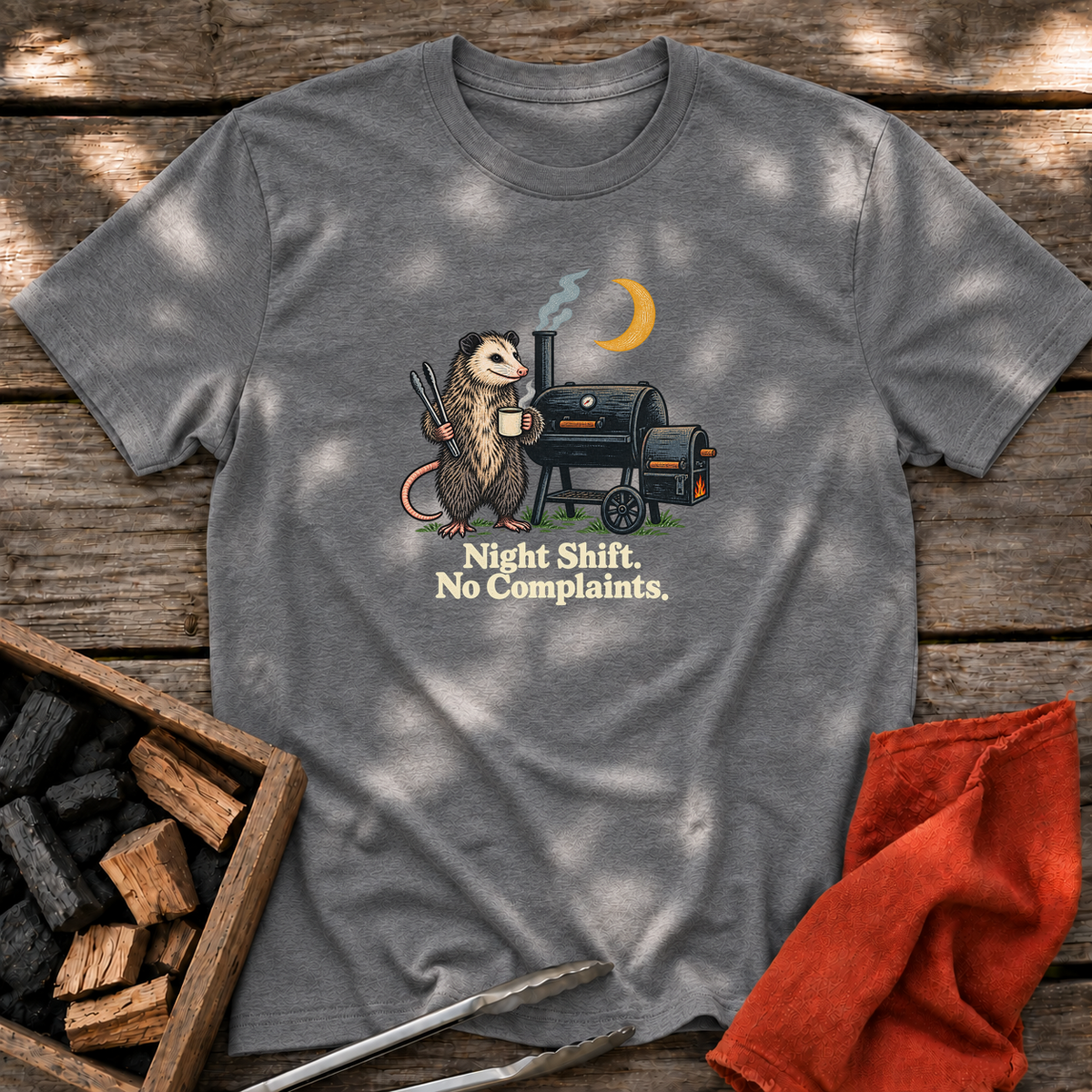 Graphite Heather T-shirt with the design “Night Shift. No Complaints.” printed on the front.