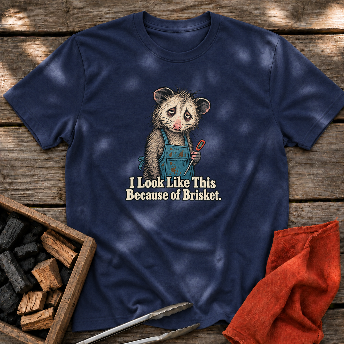 Navy T-shirt with the design “I Look Like This Because of Brisket.” printed on the front.
