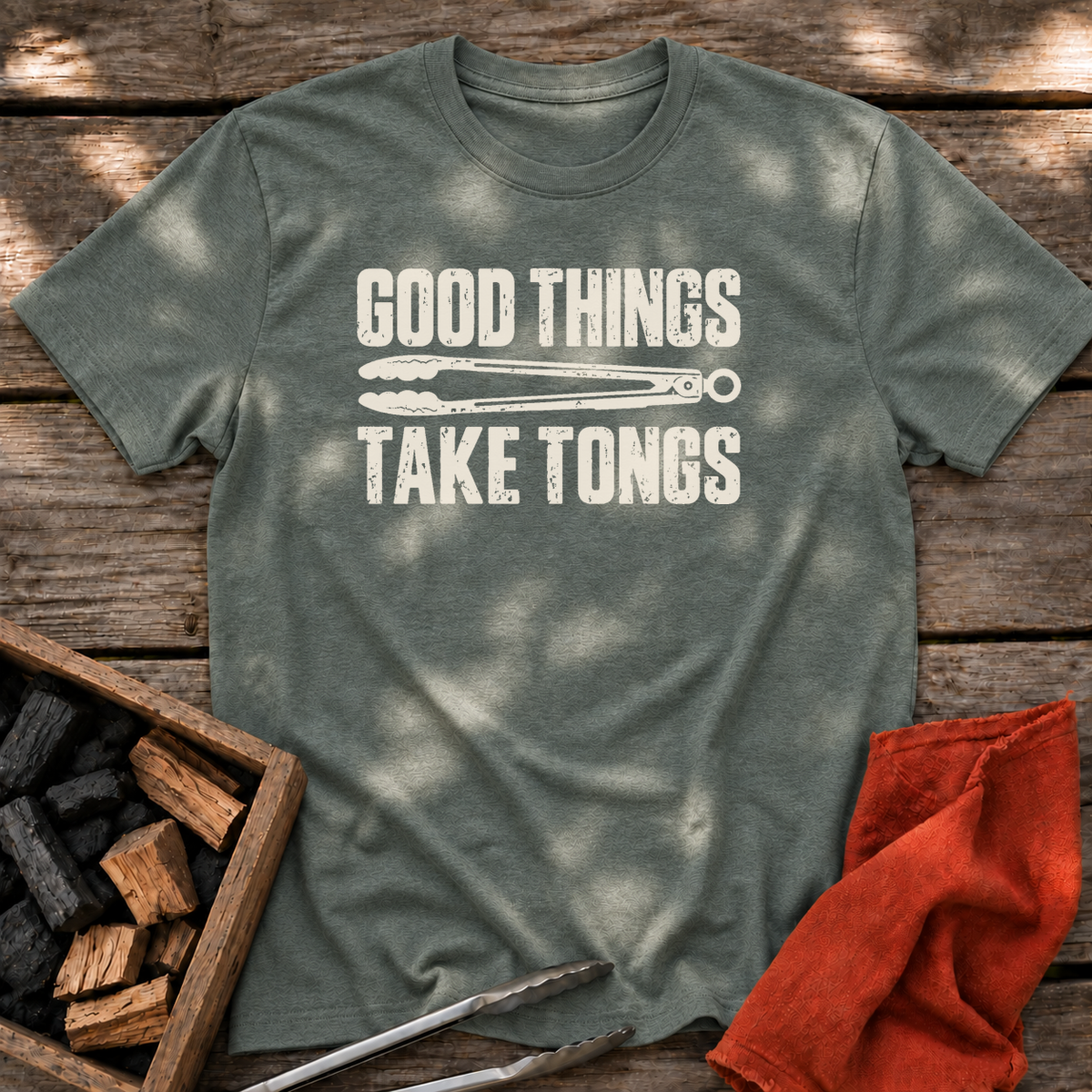 Heather Military Green T-shirt with the design “GOOD THINGS TAKE TONGS” printed on the front.