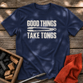 Navy T-shirt with the design “GOOD THINGS TAKE TONGS” printed on the front.