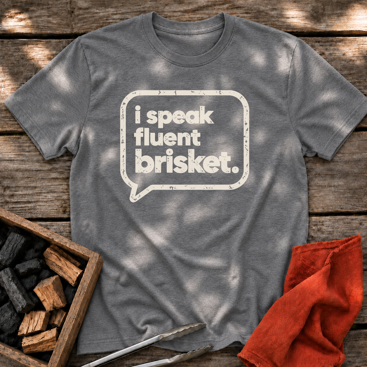 Graphite Heather T-shirt with the design “I Speak Fluent Brisket” printed on the front.