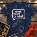 Navy T-shirt with the design “I Speak Fluent Brisket” printed on the front.