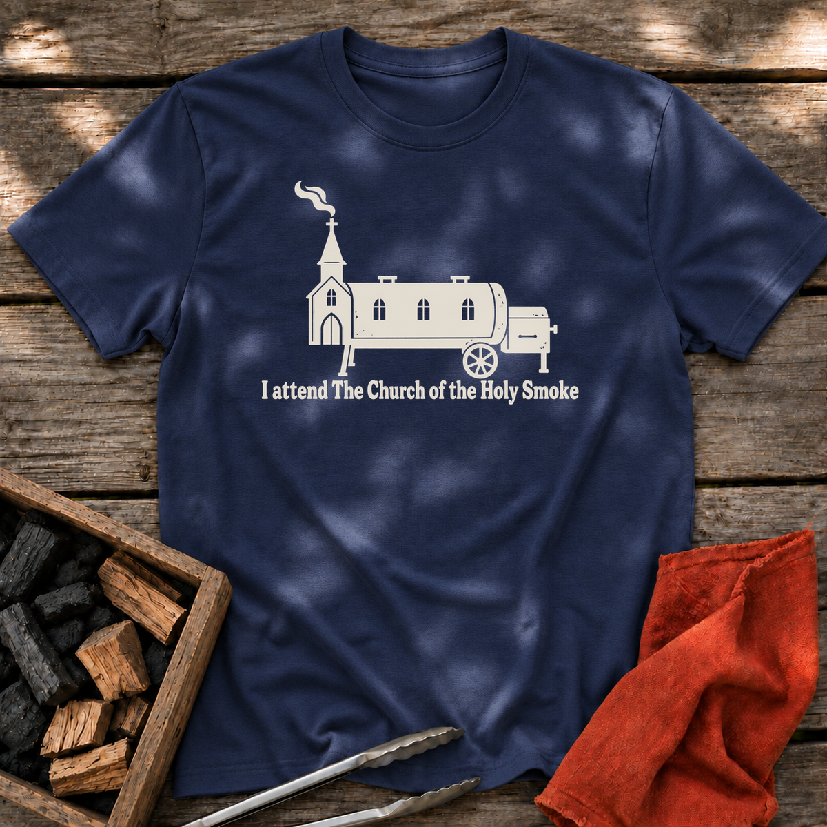 Navy T-shirt with the design “I attend The Church of the Holy Smoke” printed on the front.