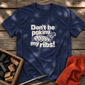 Navy T-shirt with the design “Don't be poking my ribs!” printed on the front.