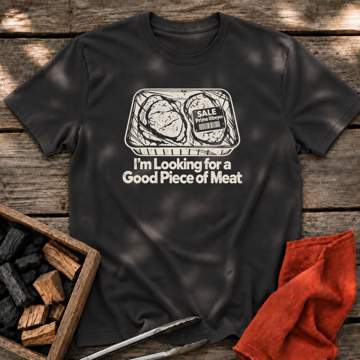 Black T-shirt with the design “I'm Looking for a Good Piece of Meat” printed on the front.