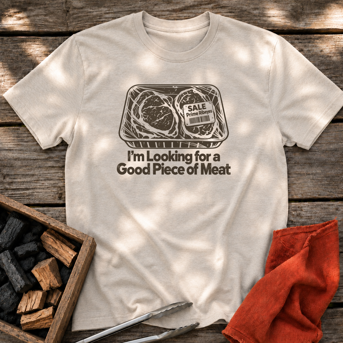 Natural T-shirt with the design “I'm Looking for a Good Piece of Meat” printed on the front.