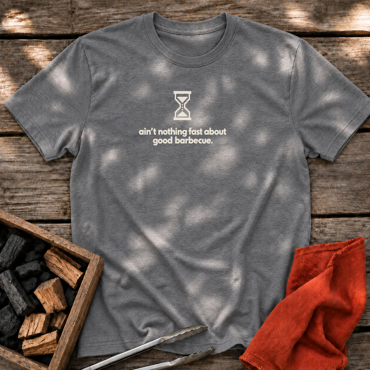 Graphite Heather T-shirt with the design “ain't nothing fast about good barbecue.” printed on the front.