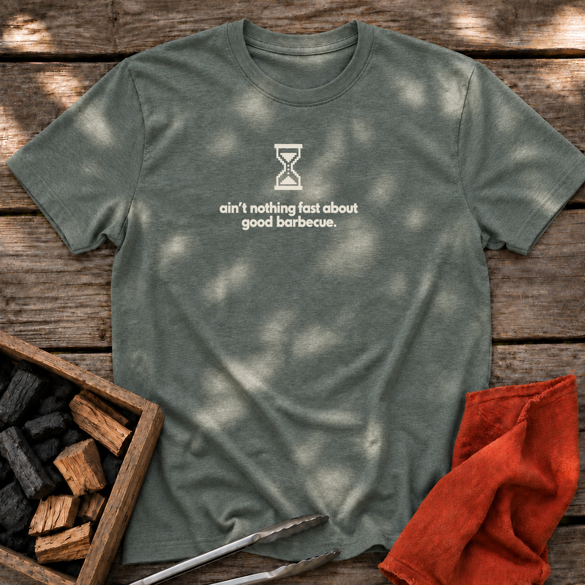 Heather Military Green T-shirt with the design “ain't nothing fast about good barbecue.” printed on the front.