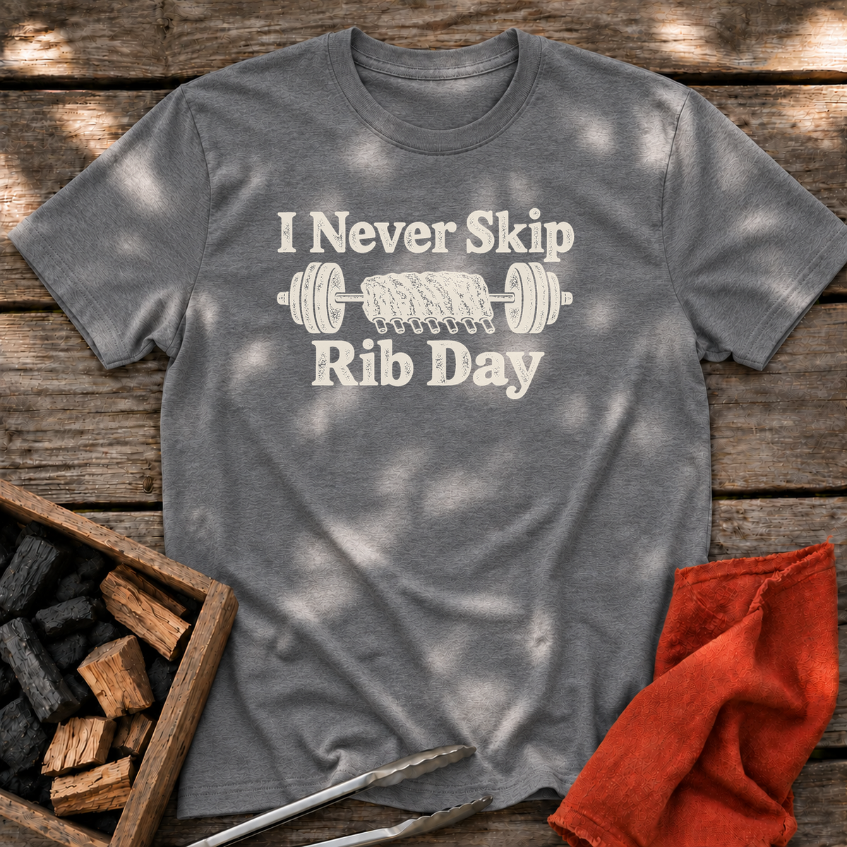 Graphite Heather T-shirt with the design “I Never Skip Rib Day” printed on the front.