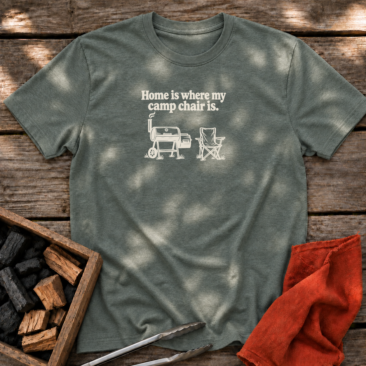 Heather Military Green T-shirt with the design “Home is where my camp chair is.” printed on the front.