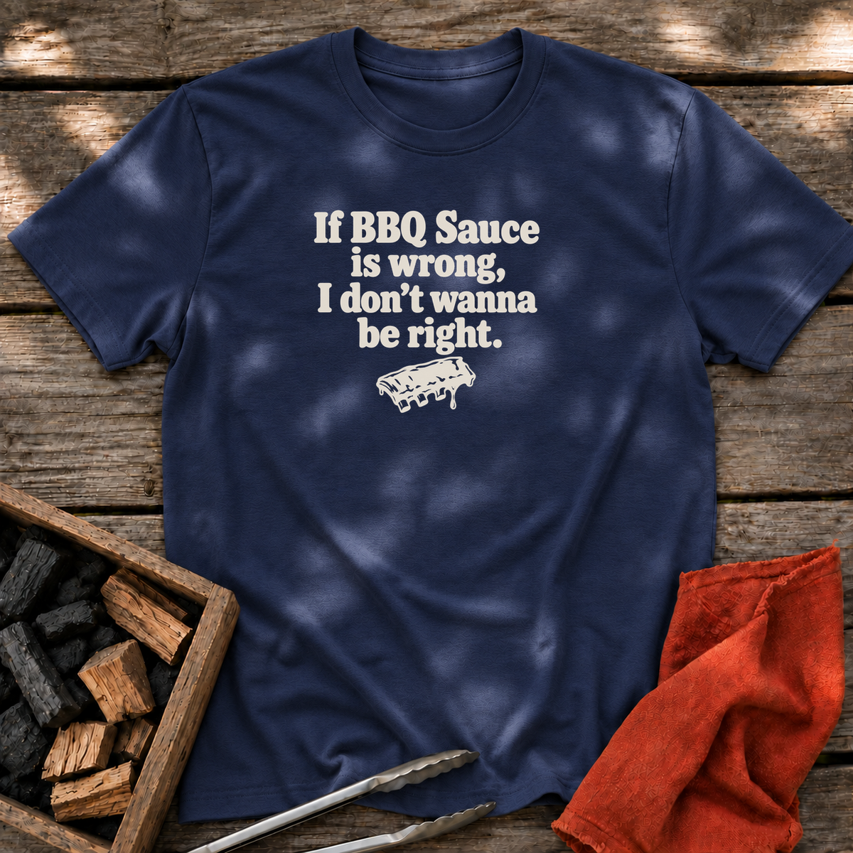 Navy T-shirt with the design “If BBQ Sauce is wrong, I don’t wanna be right.” printed on the front.