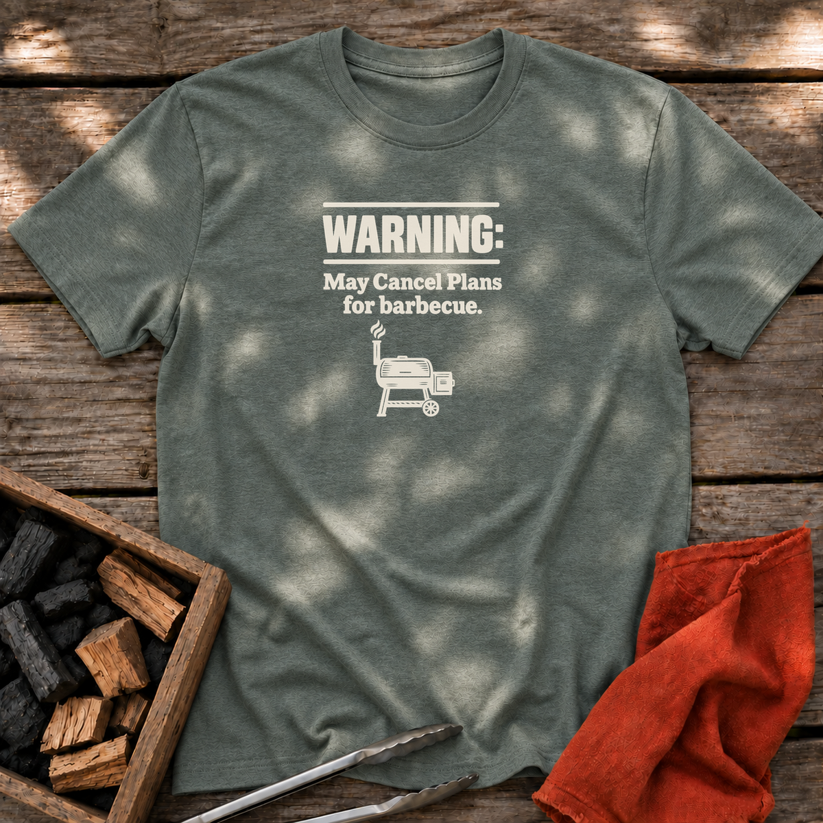 Heather Military Green T-shirt with the design “Warning: May Cancel Plans for barbecue.” printed on the front.