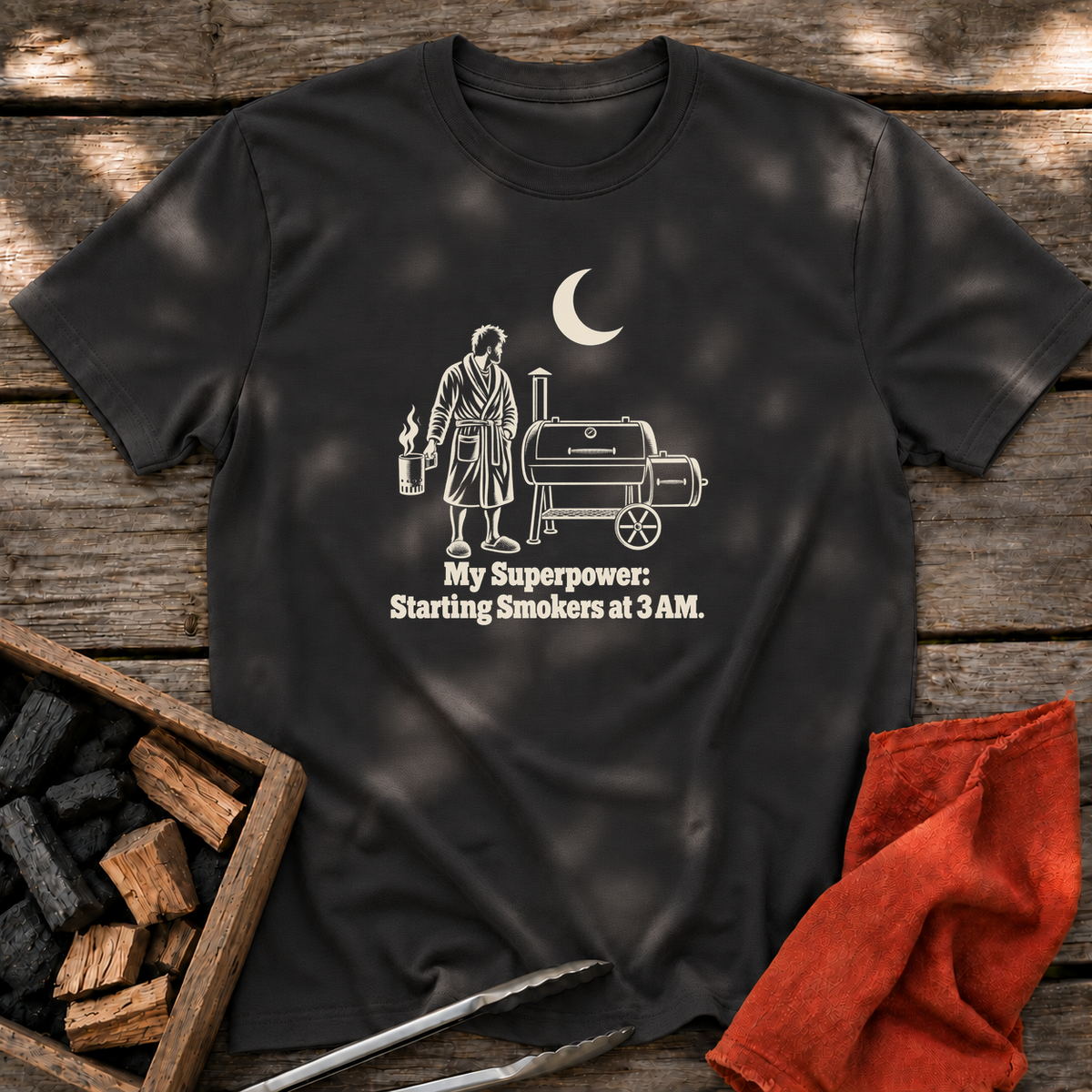 Black T-shirt with the design “My Superpower: Starting Smokers at 3 AM.” printed on the front.