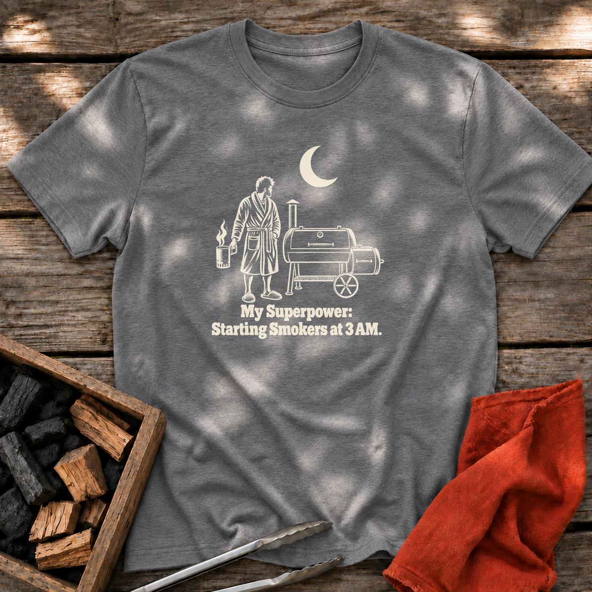 Graphite Heather T-shirt with the design “My Superpower: Starting Smokers at 3 AM.” printed on the front.