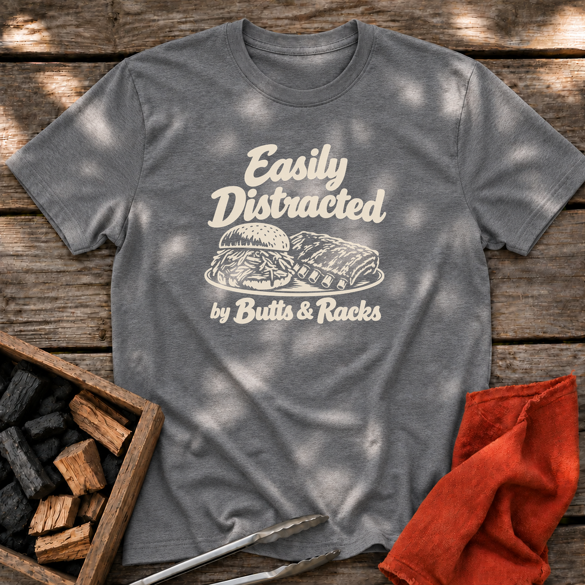 Graphite Heather T-shirt with the design “Easily Distracted by Butts & Racks” printed on the front.