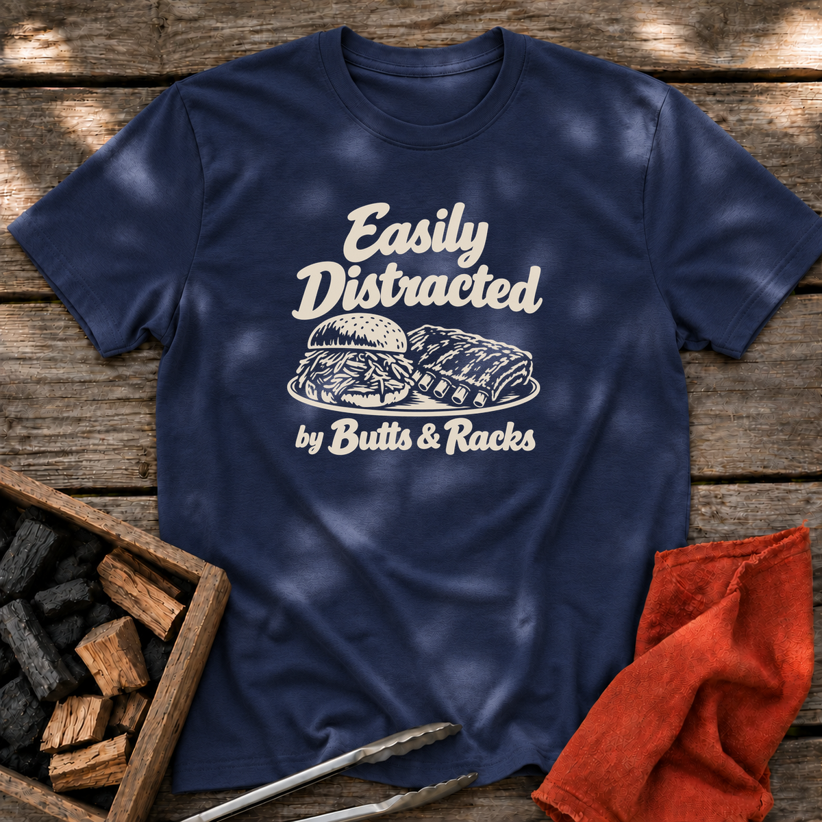 Navy T-shirt with the design “Easily Distracted by Butts & Racks” printed on the front.