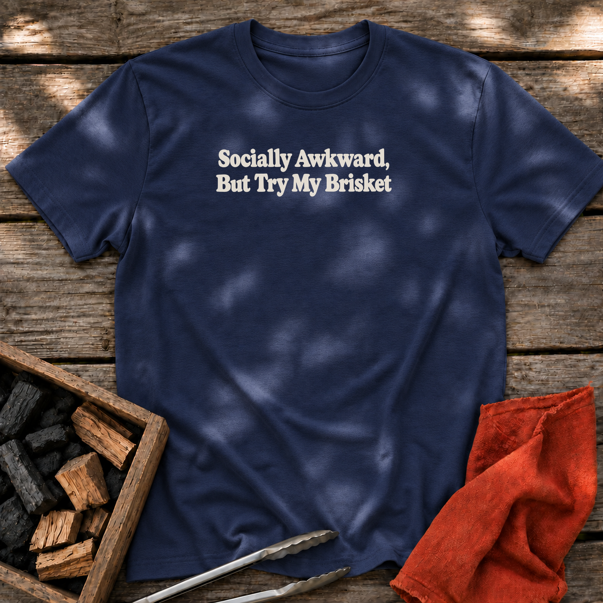 Navy T-shirt with the design “Socially Awkward, But Try My Brisket” printed on the front.