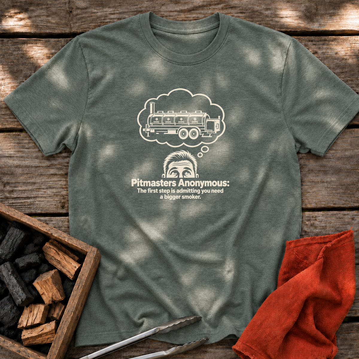Heather Military Green T-shirt with the design “Pitmasters Anonymous: The first step is admitting you need a bigger smoker.” printed on the front.