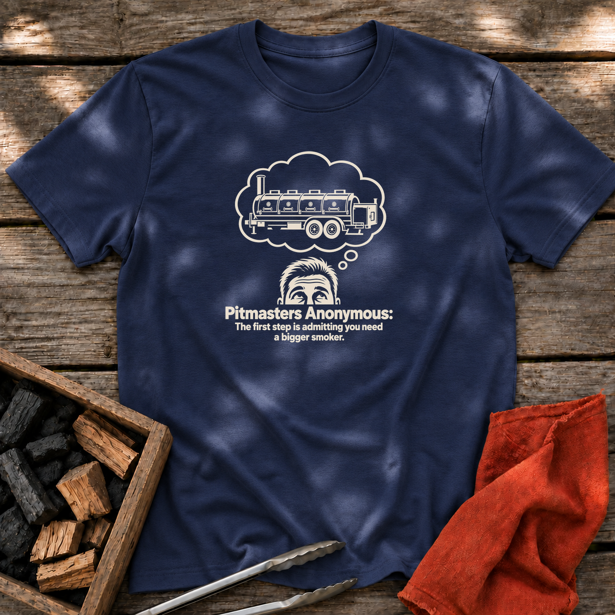 Navy T-shirt with the design “Pitmasters Anonymous: The first step is admitting you need a bigger smoker.” printed on the front.