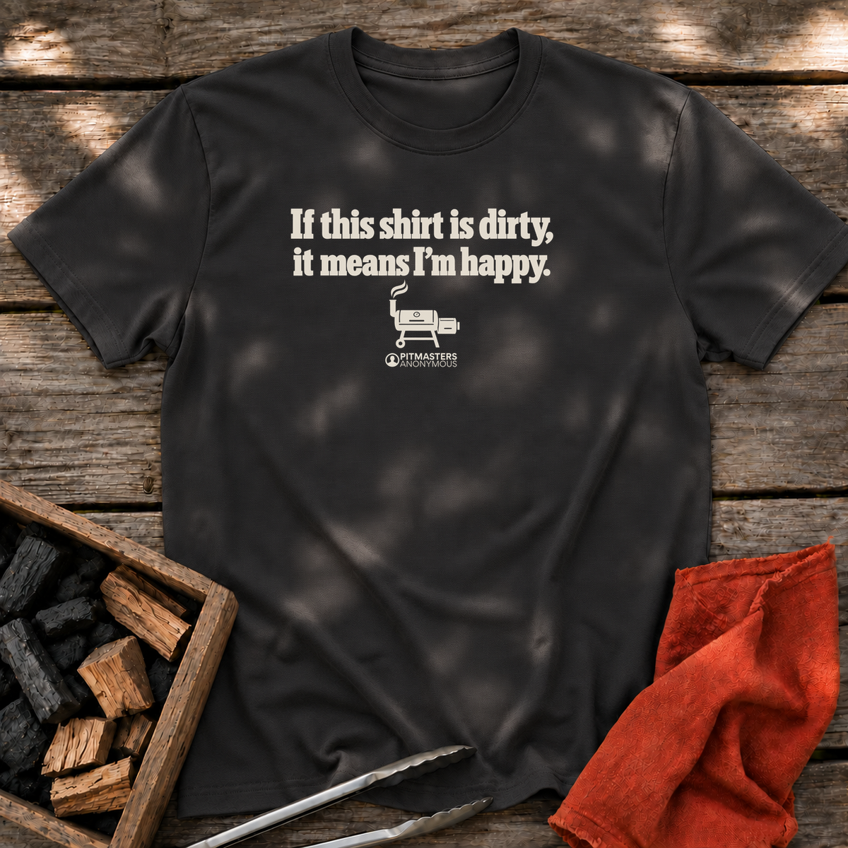 Black T-shirt with the design “If this shirt is dirty, it means I’m happy.” printed on the front.