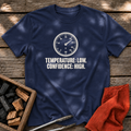 Navy T-shirt with the design “TEMPERATURE: LOW. CONFIDENCE: HIGH.” printed on the front.
