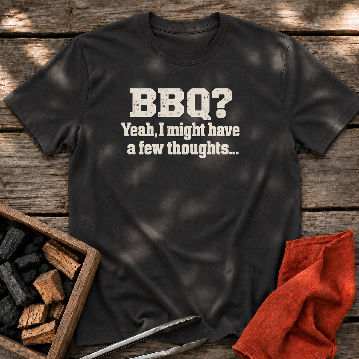 Black T-shirt with the design “BBQ? Yeah, I might have a few thoughts…” printed on the front.