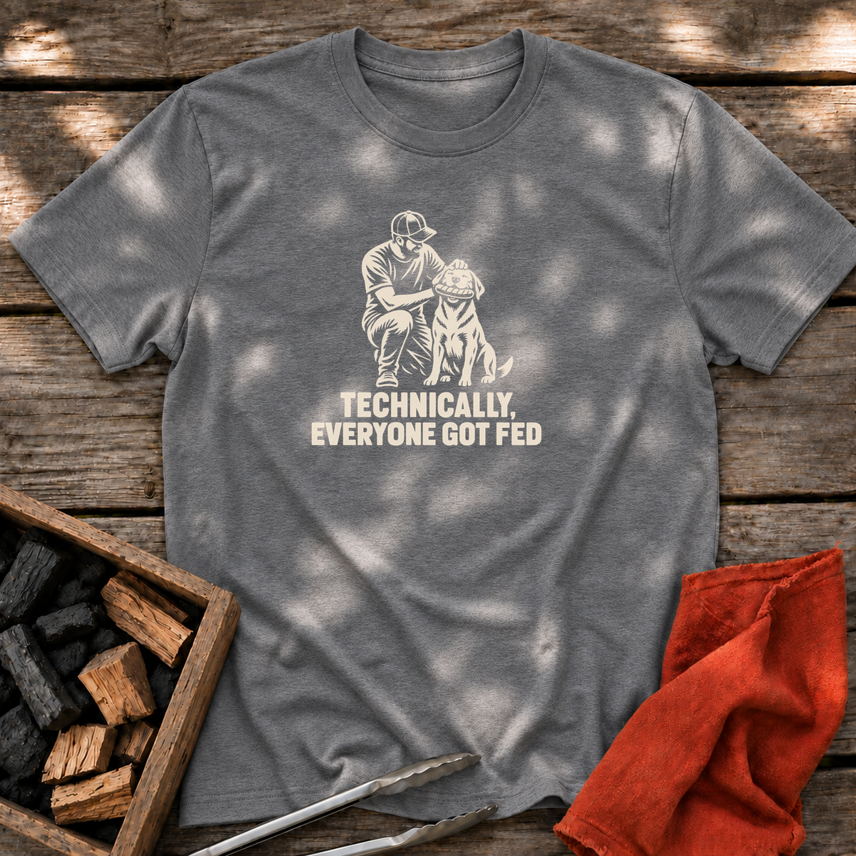 Graphite Heather T-shirt with the design “TECHNICALLY, EVERYONE GOT FED” printed on the front.