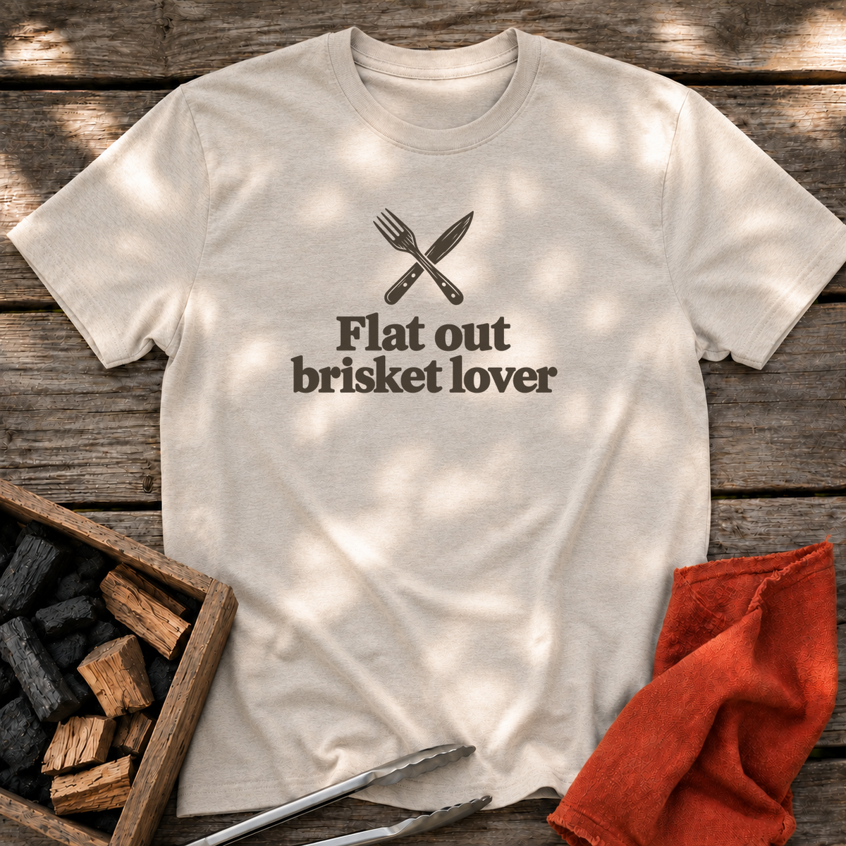 Natural T-shirt with the design “Flat out brisket lover” printed on the front.