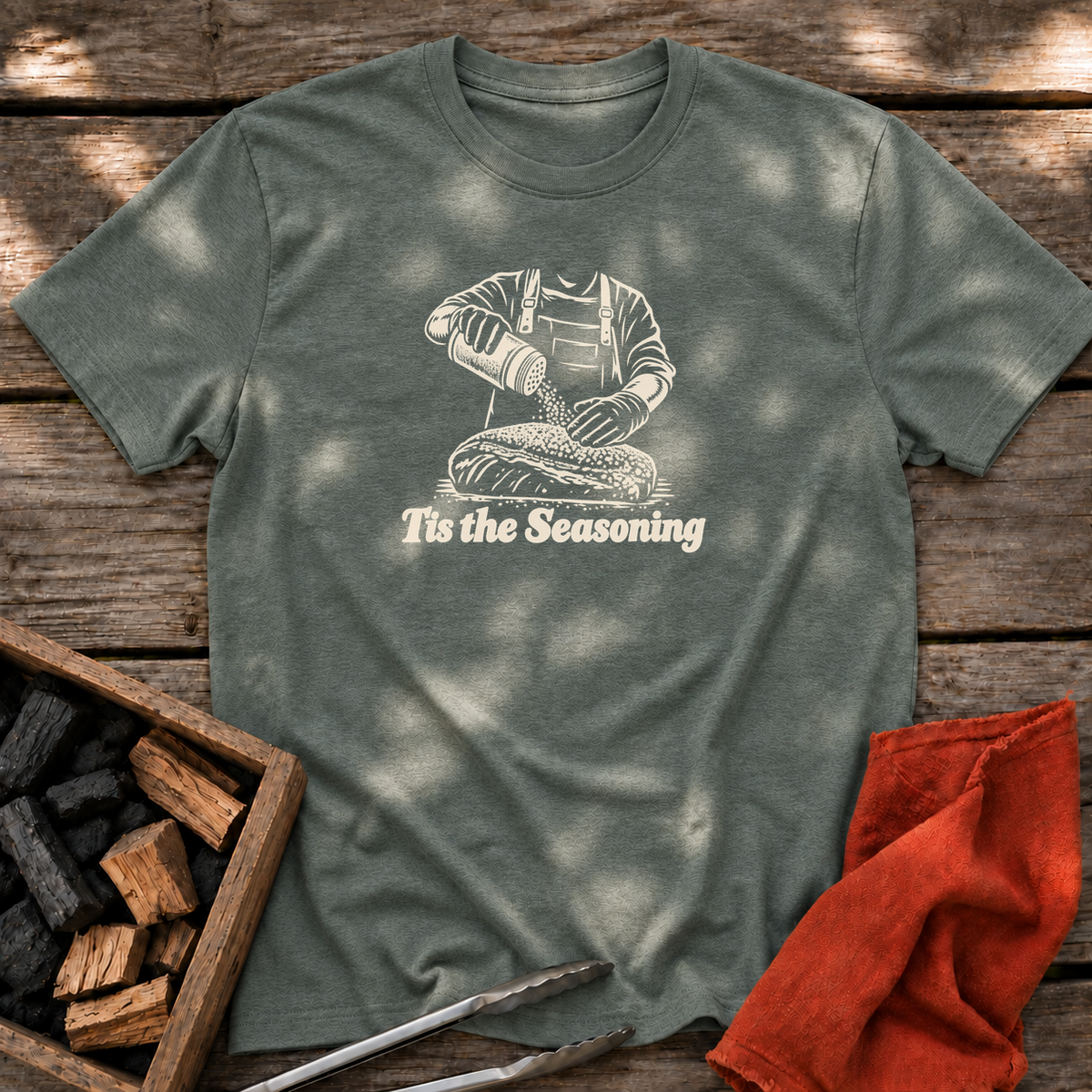 Heather Military Green T-shirt with the design “Tis the Seasoning” printed on the front.
