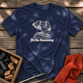 Navy T-shirt with the design “Tis the Seasoning” printed on the front.