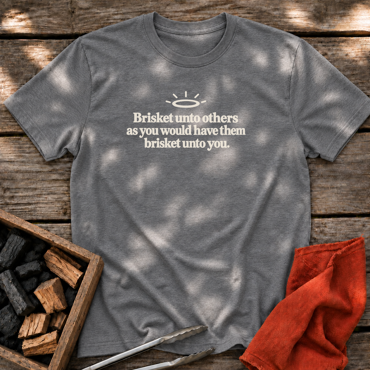 Graphite Heather T-shirt with the design “Brisket unto others as you would have them brisket unto you.” printed on the front.