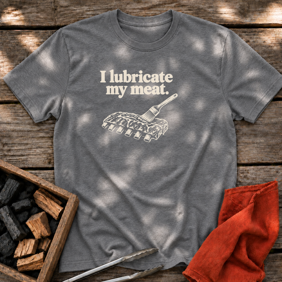 Graphite Heather T-shirt with the design “I lubricate my meat.” printed on the front.