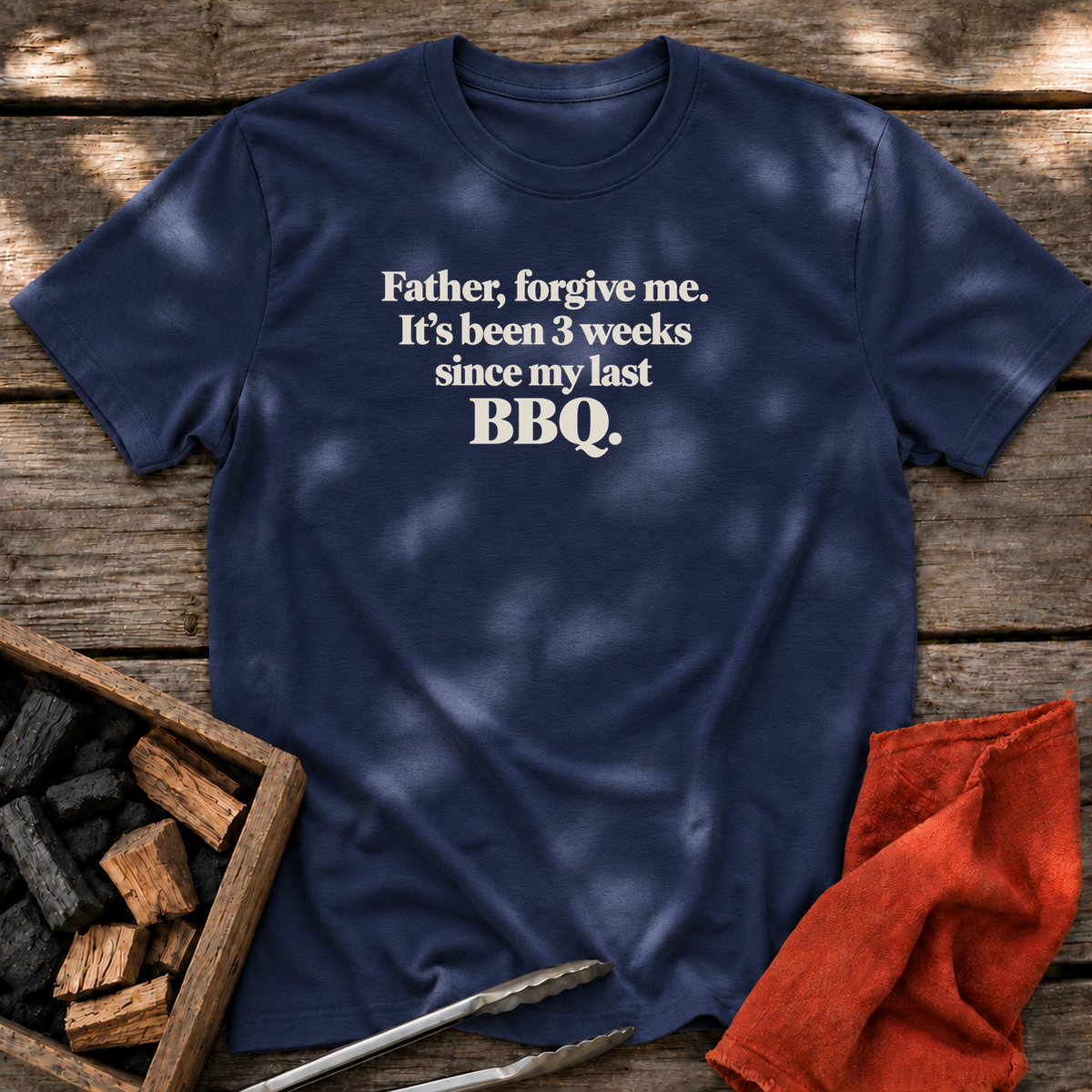 Navy T-shirt with the design “Father, forgive me. It's been 3 weeks since my last BBQ” printed on the front.