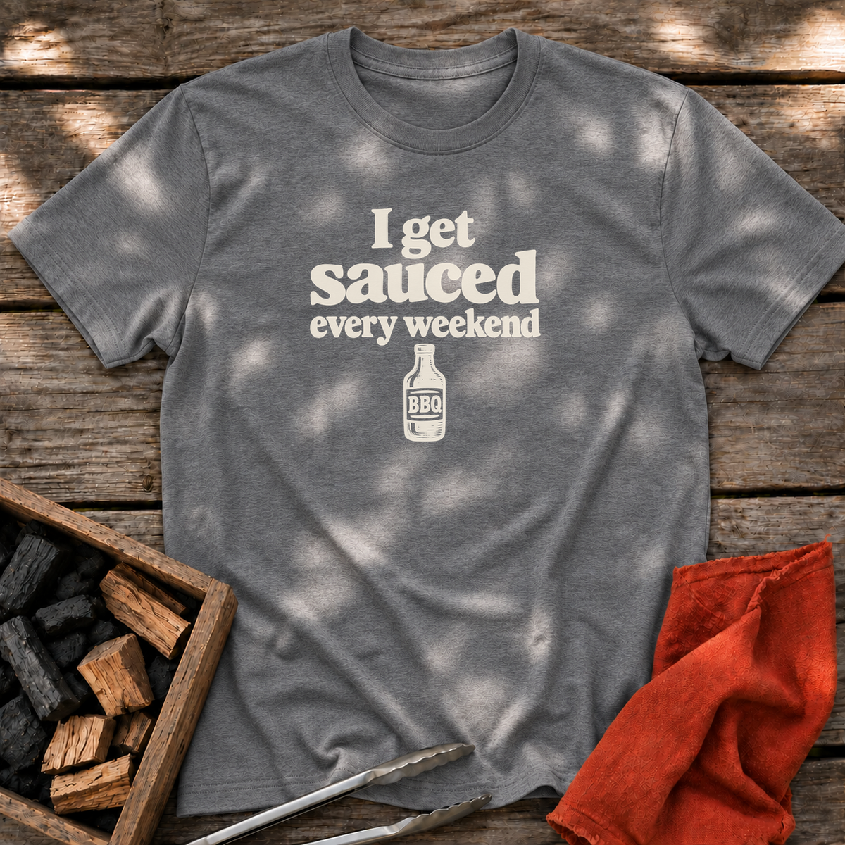 Graphite Heather T-shirt with the design “I get sauced every weekend” printed on the front.