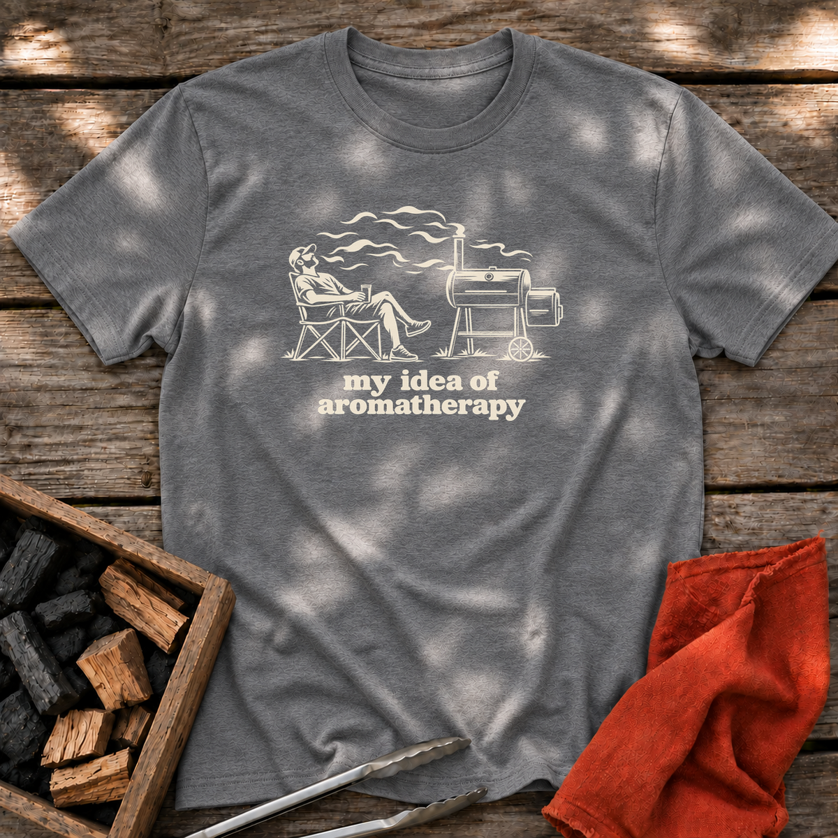 Graphite Heather T-shirt with the design “my idea of aromatherapy” printed on the front.