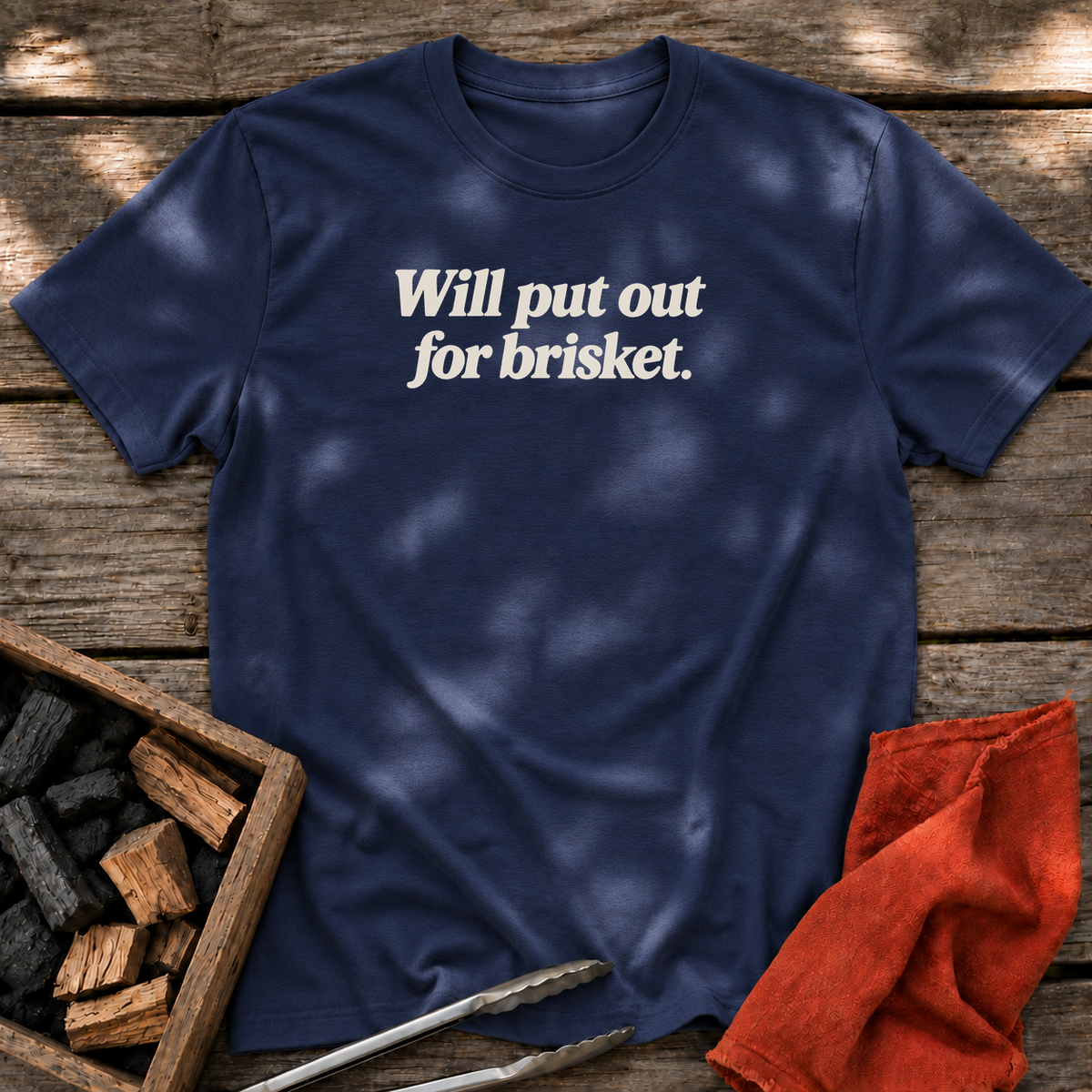 Navy T-shirt with the design “Will put out for brisket.” printed on the front.