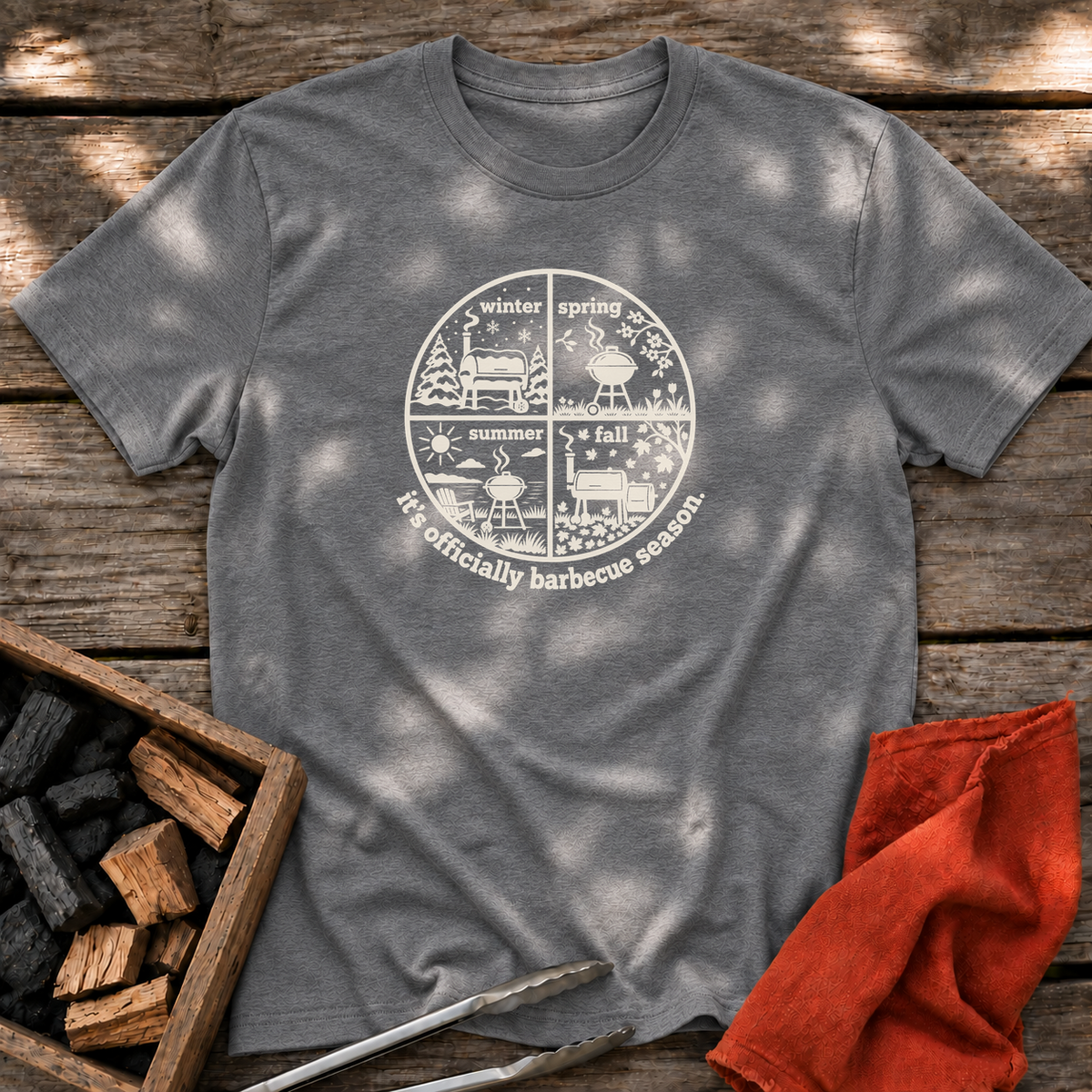 Graphite Heather T-shirt with the design “it's officially barbecue season” printed on the front.
