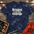 Navy T-shirt with the design “Brisket is my love language.” printed on the front.