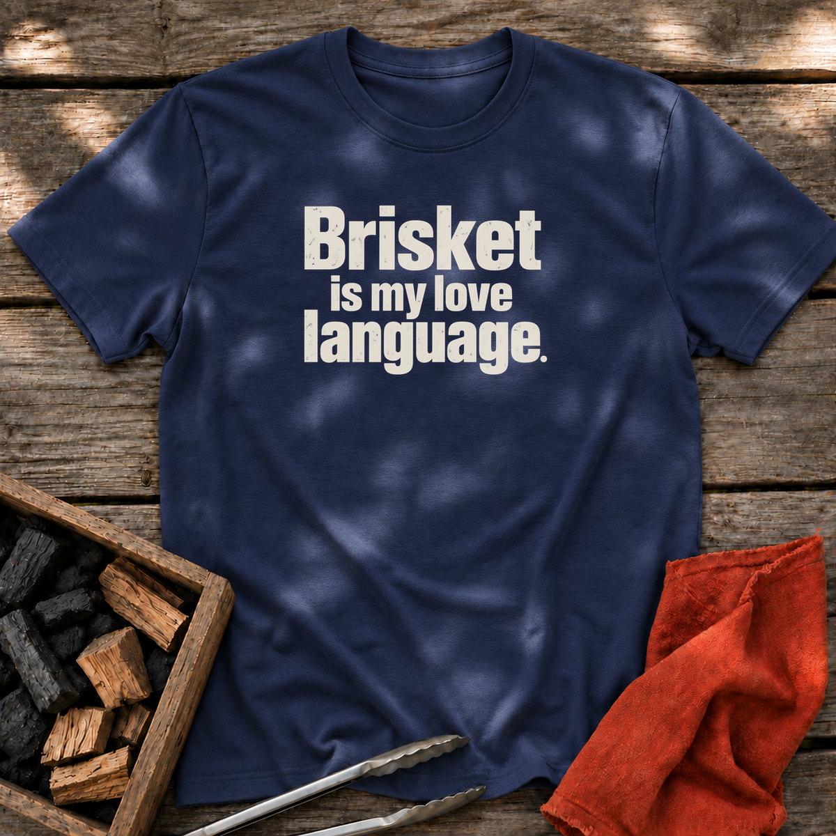 Navy T-shirt with the design “Brisket is my love language.” printed on the front.