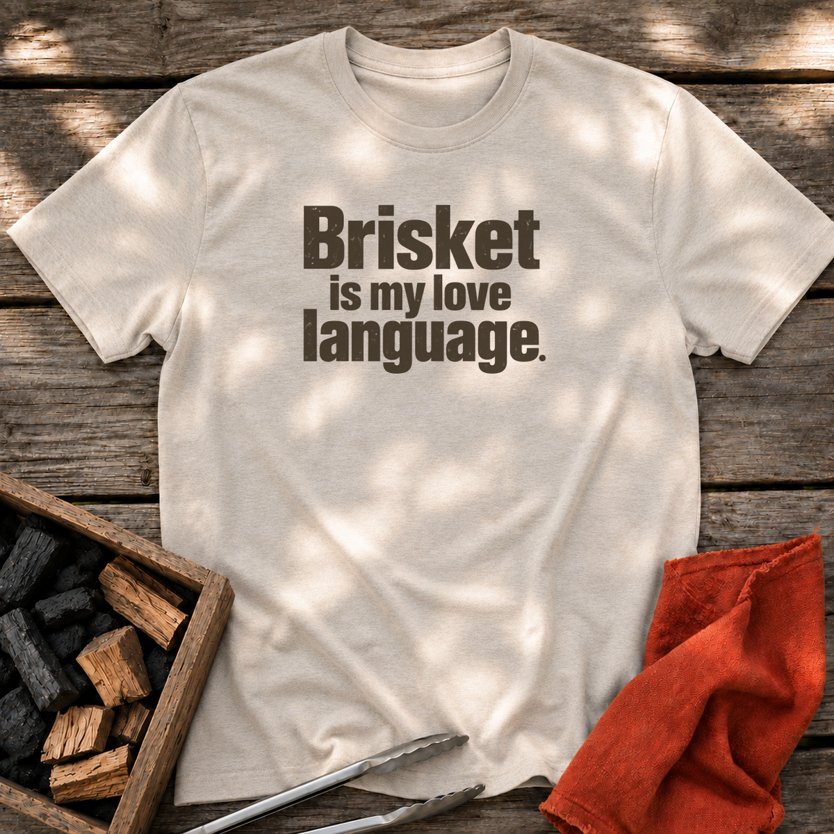 Natural T-shirt with the design “Brisket is my love language.” printed on the front.