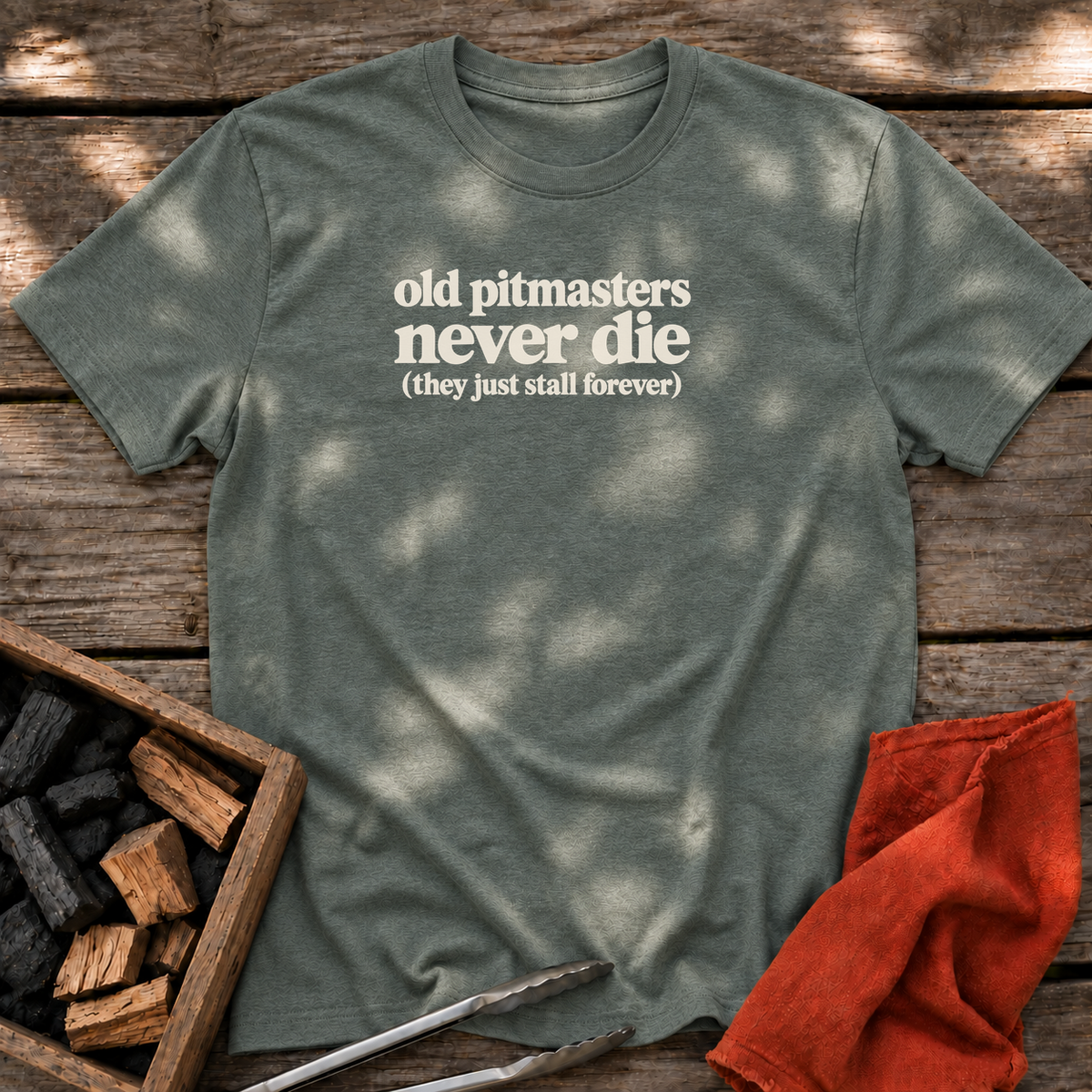 Heather Military Green T-shirt with the design “old pitmasters never die (they just stall forever)” printed on the front.