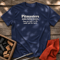 Navy T-shirt with the design “Pitmasters make better lovers. They can hold it in the sweet spot for hours.” printed on the front.
